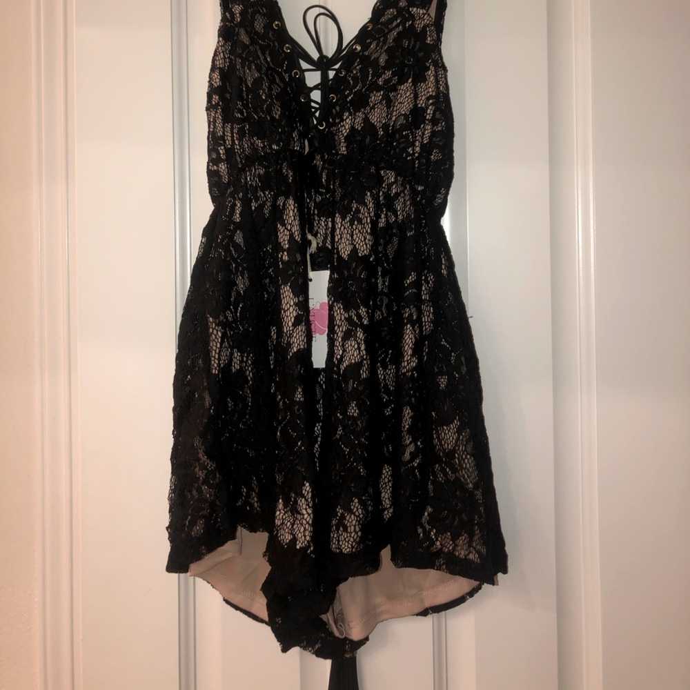 Small black lace-up romper! Tag still on!